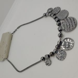 Erica Lyons Silver Tone Medallions Statement